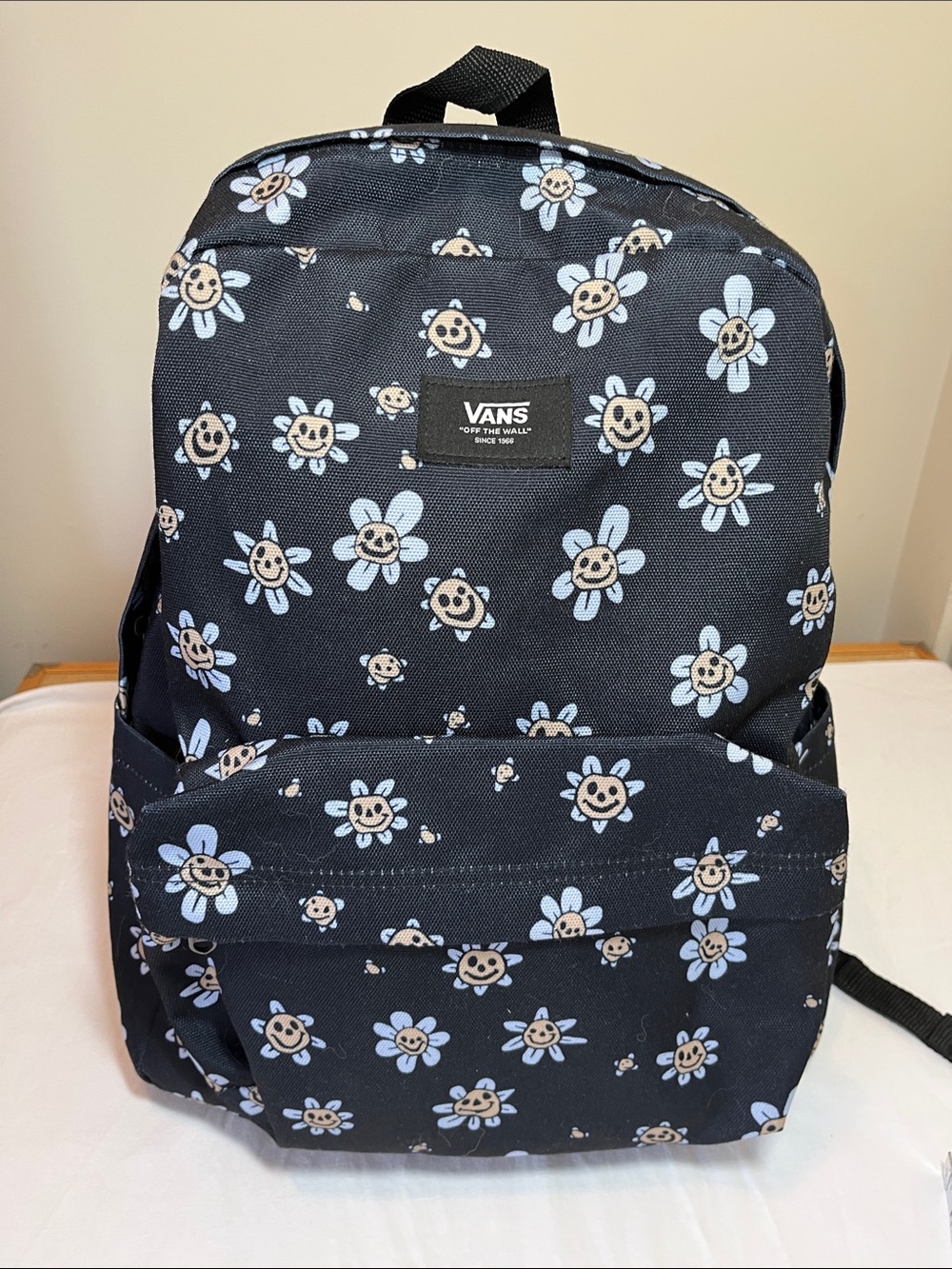 Vans Black Backpack with Blue and Tan Smiley Daisies